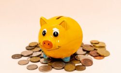 yellow-piggy-bank-with-stack-coins